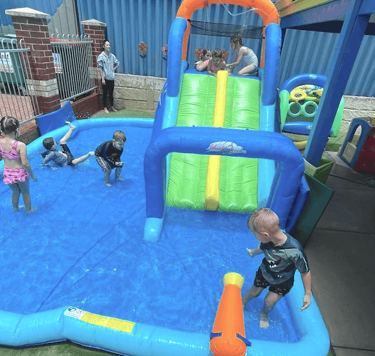 Children playing in pool at day care